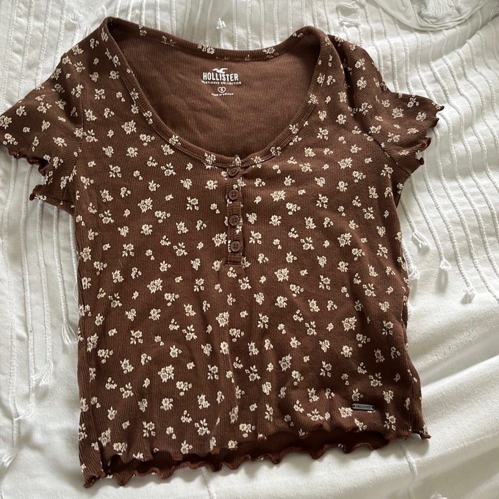 Hollister button up T shirts in black, brown and white.